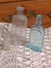 Lot Of 5  Embossed Antique Medicine Bottles