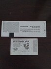 A Collection Of 2 Skynyrd Concert Tickets Plus 2 Tour Buttons And A Keychain