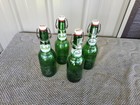 4 Vintage Grolsch Beer Bottles Green Glass Porcelain Flip Swing Top W seals