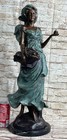 Signed Bronze Sculpture Statue Of  A Young Woman Holding Basket Of Fruits