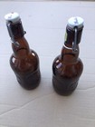 Two Grolsch Glass Bottles