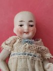 Antique German 2-5 8    All Bisque Miniature Smiling Dollhouse Baby Doll 