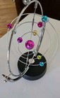 Kinetic Perpetual Motion Galaxy Desk Toy  Outer Space Gadget Flips And Rotates