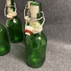 4 Vintage Grolsch Beer Green Embossed Bottles Porcelain Swing Top Empty