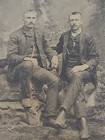 19thc Tintype Photo Two Men Close Companion Pose Rustic Studio Mustache Boots