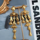 Schiaparelli Retro Charm Gold Tone Texture Facial Features Pendant Earrings