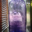 1897 Hayner Whiskey Distillery Troy ohio Amethyst 1 2 Pint Oval Flask W panels