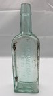 Shiloh s Consumption Cure  Embossed Aqua Bottle  S  C  Wells   Co  Leroy  N y 