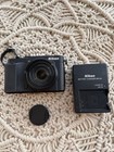 Nikon Coolpix P7700 12 2mp Digital Camera Black  for Parts repair  Goes Crazy