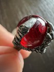 Metal Dragon Claw Pendant Holding A Red Orb