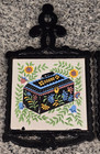 Lot Of 2 Vintage Enesco Cast Iron Ceramic Tile  early American Tinware  Trivets