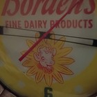 Borden s Fine Dairy Products Advertising Wall Clock Yellow White Red Green
