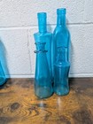 Vtg Apothecary Bermuda Blue Glass Decorative Bottles Mcm Set Of 4 Aqua Oil Jars