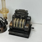 Vtg 3 Miniature Die Cast Metal Pencil Sharpeners Oil Lamps   Cash Register