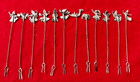 Set Of  12  Asian Motif Silver 3 3 4  Hors D oeuvres cocktail Picks