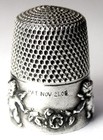 Antique Simons Bros  Sterling Silver Thimble     cupid     Cherubs   Flowers  C1910s