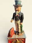 Vintage Cast Iron Uncle Sam Mechanical Coin Bank     Heavy - Coin Drop  working 