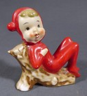 Vintage Red Elf Pixie Christmas Japan Reclining On Log Figurine Ceramic
