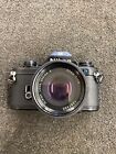 Nikon Em 35mm Slr Film Camera With 50 Mm Lens Kit