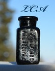 Tiny Black Glass Antique Poison Bottle H k  Mulford Co Philadelphia
