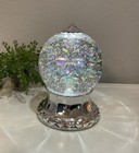 Christmas 5    Snow Globe Lighted Rotating Silver Snowflake Swirling Glitter