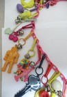 Rare Vintage 1980 s Plastic Bell Charm Necklace W  29 Charms Good Variety