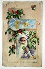 C 1909 Green Santa With Toy Christmas Postcard Color Lithograph  97