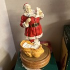Two Vintage Coca Cola Santa Figurines