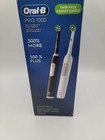 Oral B Pro 1000 Cross Action Electric  Toothbrush Black And White Twin Pack