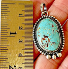 Navajo Natural Turquoise Pendant 1 75 In Signed A Oval Sterling Matte Patina