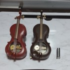 Two Violin-shaped Music Boxes A Small Storage Case 