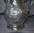 Large Antique  Repousse Silverplate Covered  Water Pitcher