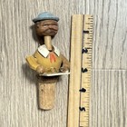 Vintage Anri Bottle Stopper Wood Man Reading Hand Carved Cork Mechanical
