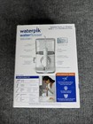 Waterpik Evolution Water Flosser New Sealed W  6 Tips White