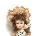 Dollhouse Miniature Tiny Porcelain Girl Doll In A Green Outfit