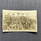 Antique Postcard  Rppc Wwi Military Soldiers Group Outside Partially Identified