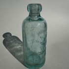 C i  Lorenzon 655   57 Austin Ave  Chicago Embossed Hutchinson Bottle