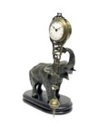 German Junghans Style Porcelain Dial Brass Elephant Swinging Clock