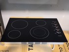 Frigidaire 30    Electric Cooktop Ffec3025ub Black Glass 4 Element Open Box