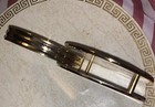 Brass Enclosed Magnifying Glass On A Hinge   with A Felt Covered Bottom 