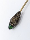 Antique Victorian Hat Pin 10  Green Glass Cabochon Ornate Filigree Brass