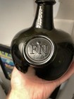Dark Green Glass Onion Style Bottle Embossed  fn  Seal W  Seal