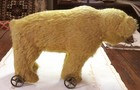 Vintage Early 20th Century Tan Mohair Hump Back Bear On Wheels Pull Toy 