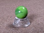 Vintage Reddy Kilowatt Marble With Stand  green 