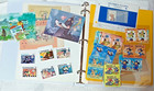 The Disney World Of Postage Stamps Album With Aprox 250 Total Stamps