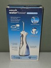 New   Sealed  Waterpik Water Flosser Cordless Plus Model Wp-450w