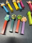 Lot Of 26 Mix Figures Simpsons  Muppets  Snoopy  Pooh  Flintstones Pez Dispenser