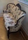 Victorian-style Carved Wood Parlor Loveseat Floral Fabric