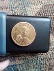 2010 Sacagawea  1 Coin Obverse Circle Planchet Error   Weak Edge Lettering Error