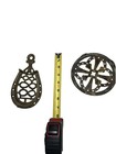 1 Brass And 1 Cast Iron Trivet